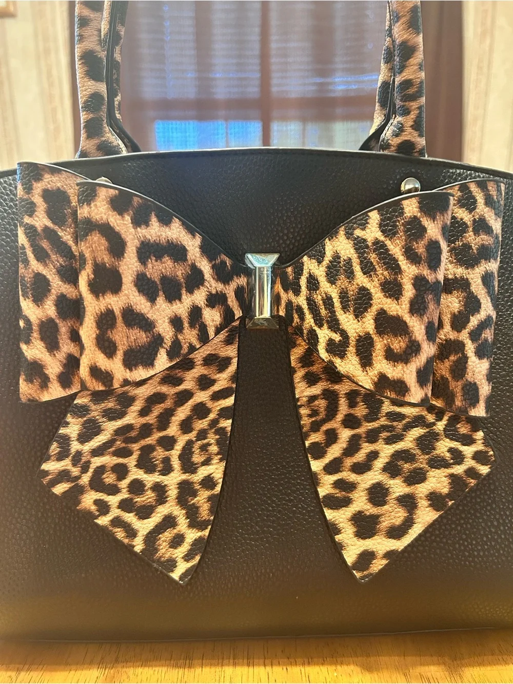 Crossi Chic Black Satchel with Leopard Bow Accent